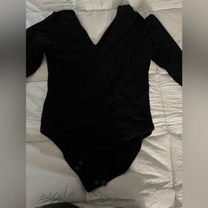 Black body suit with snaps
